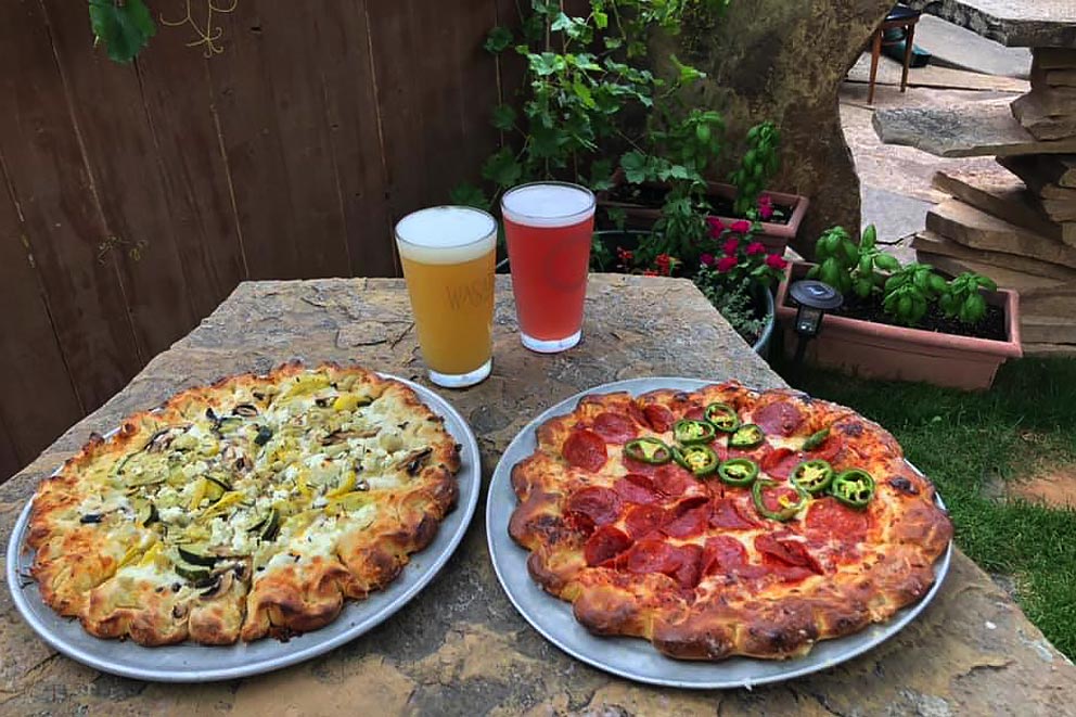 Two pizzas and two beers